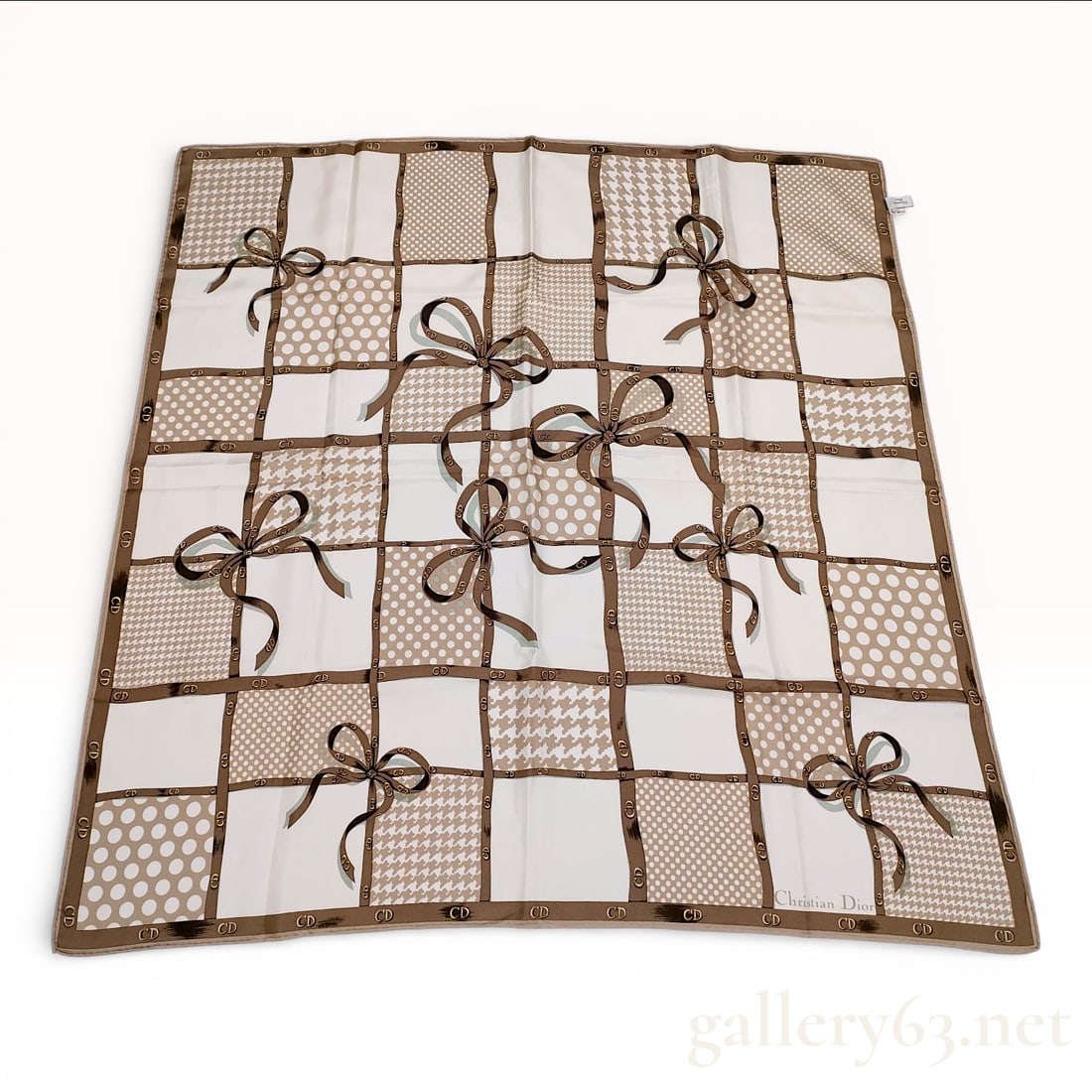 Christian Dior Silk Twill Square Scarf with Houndstooth, Polka Dot, and Logo Ribbon Motif: This vintage Christian Dior square scarf is crafted from luxurious silk twill. The design features a sophisticated multi-layered checkered grid pattern, alternating between solid white panels, beige a