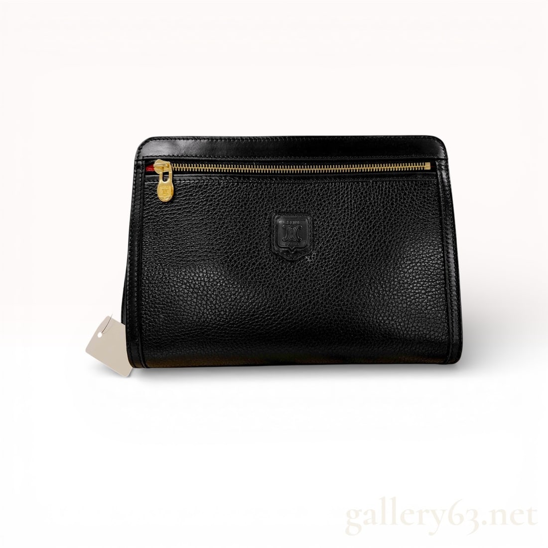Celine Vintage Triomphe Blazon Grained Leather Document Clutch, Black: This authentic vintage Celine document clutch is a sophisticated organizational piece crafted from durable black grained leather with smooth leather trim. The front is accented with an embossed leathe