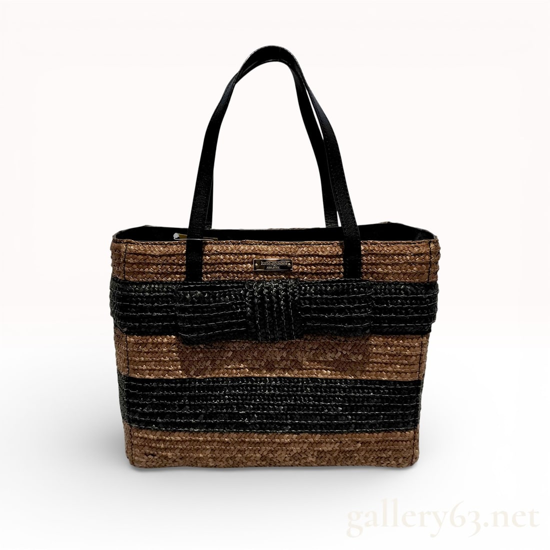Kate Spade New York Bow Terrace Striped Straw Tote, Metallic Bronze and Black: This Kate Spade New York Bow Terrace tote is crafted from woven straw featuring alternating horizontal stripes of metallic bronze-toned tan and black. The front of the bag is accented with a large, ma