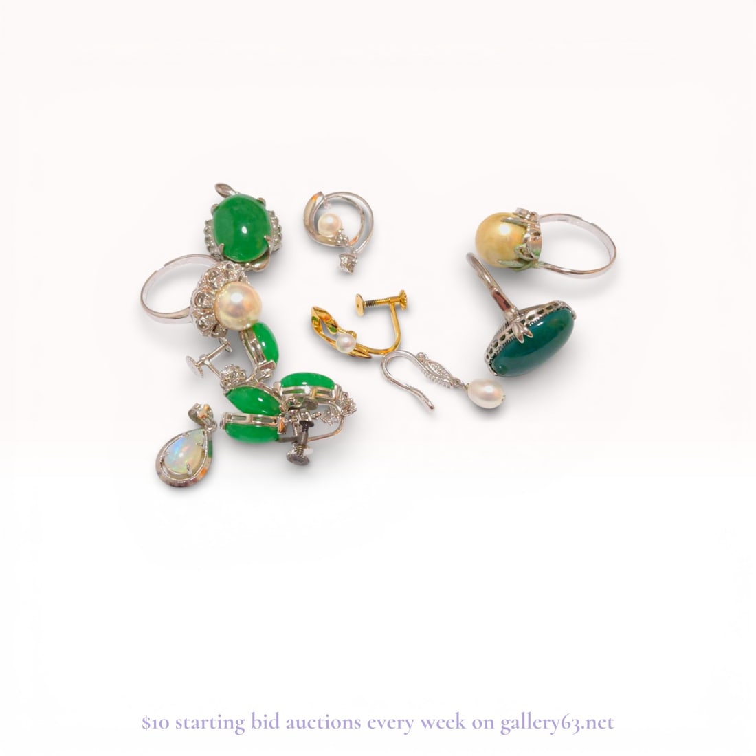 Silver and Gold-Tone Earring Collection with Art Deco Style Jade-Tone Cabochons and Pearls: This collection of earrings features a variety of styles including one matched pair and three single pieces. The primary pair consists of Art Deco style silver-tone drop earrings set with two oval gre