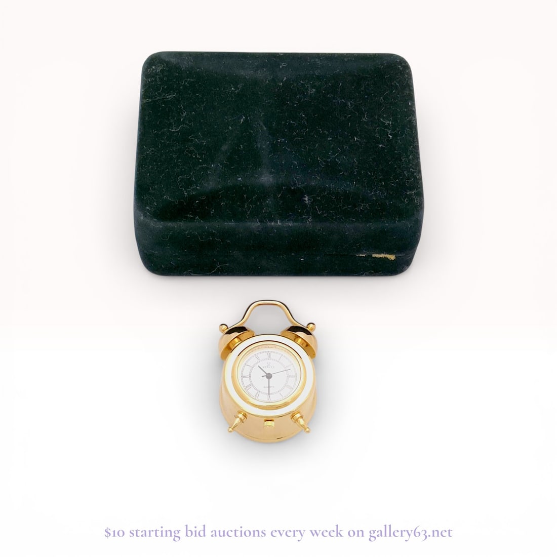 Vexcel Miniature Gold-Tone Quartz Twin-Bell Style Desk Clock, Late 20th Century: A miniature novelty desk clock manufactured by Vexcel, styled after a traditional twin-bell alarm clock. The piece is constructed with a polished gold-tone metal case featuring decorative twin bells,