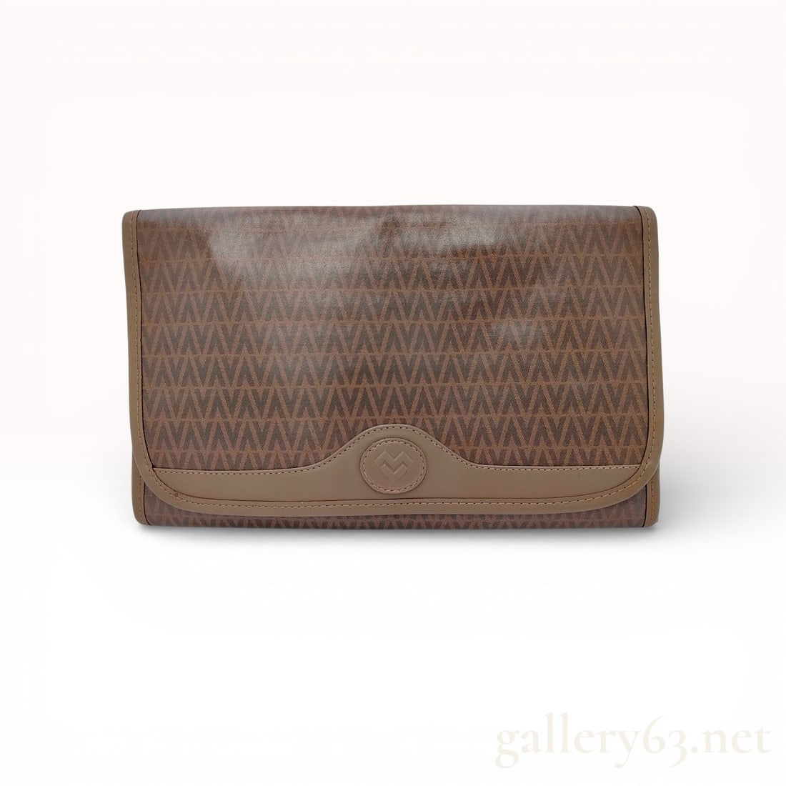 Mario Valentino Vintage Monogram Coated Canvas Envelope Clutch Bag in Brown: This vintage Mario Valentino clutch is crafted from the brand's signature "V" monogram coated canvas in a classic brown colorway. The envelope-style silhouette features a front flap accented