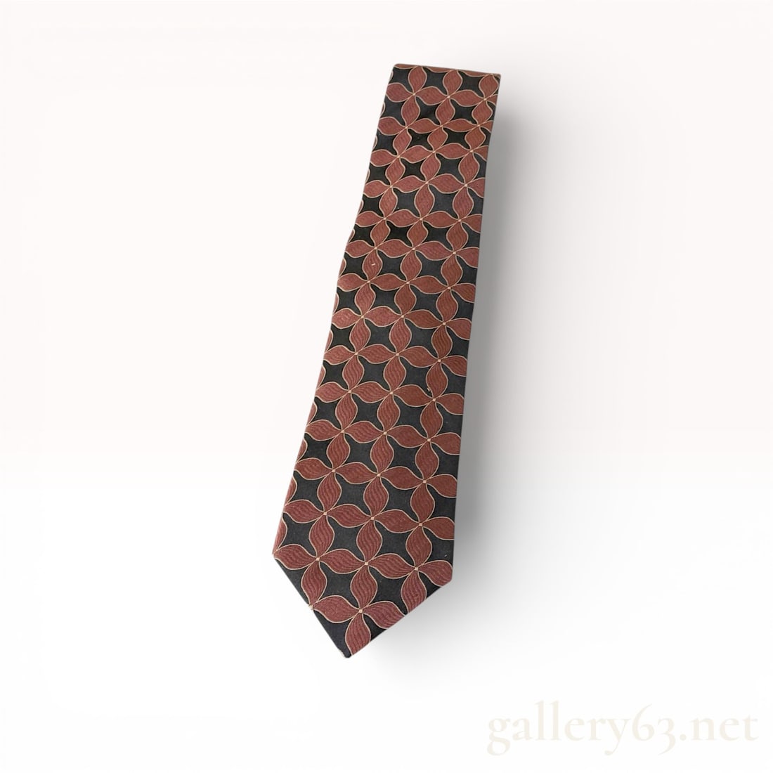 Lanvin Paris Silk Necktie, Geometric Floral Motif: A professional men's necktie by Lanvin Paris, expertly crafted in France from 100% silk. The design features a sophisticated repeating geometric quatrefoil or floral motif, characterized by textured c