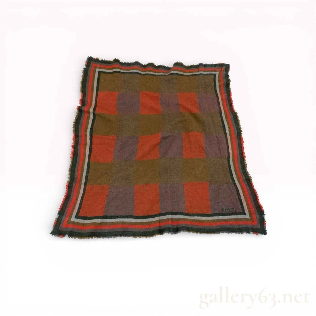 Yves Saint Laurent Wool-Silk Blend Geometric Color-Block Scarf: This square scarf by Yves Saint Laurent is crafted from a soft, brushed 60% wool and 40% silk blend, providing a textured and sophisticated hand. The design features a central geometric color-block mo