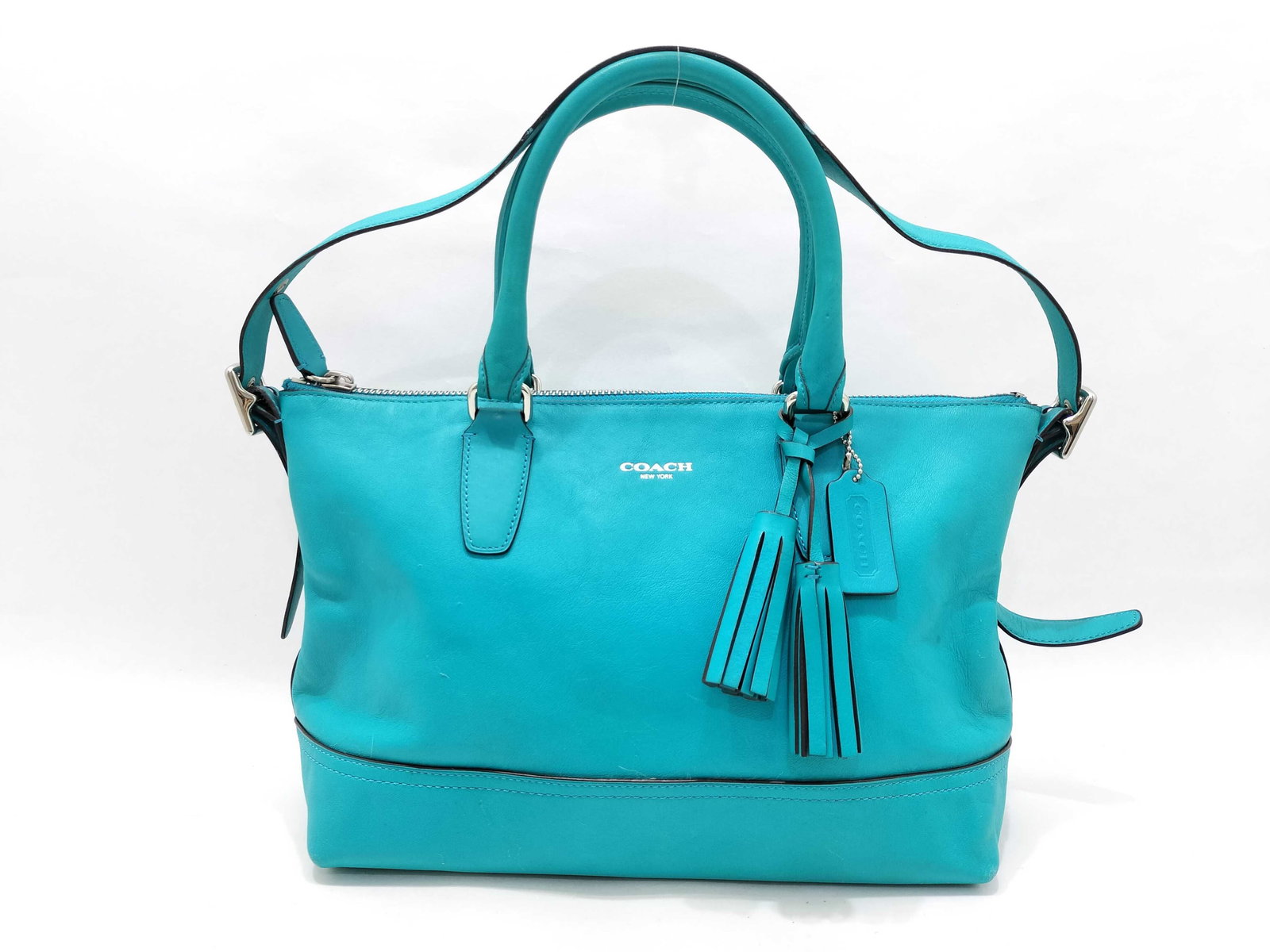 Coach Legacy Candace Carryall Leather Satchel, Robin Blue: This Coach Legacy Candace Carryall is crafted from smooth, high-quality leather in a vibrant turquoise shade known as Robin Blue. A standout piece from the 2012 Legacy collection, it features a struct