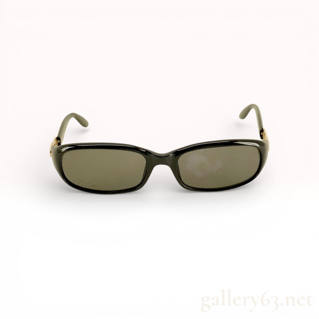 Christian Dior Sunglasses, Black Optyl: A pair of vintage Christian Dior Dolce Vita sunglasses. These frames feature a classic rectangular silhouette crafted from polished black Optyl, a high-quality and lightweight hypoallergenic plastic.
