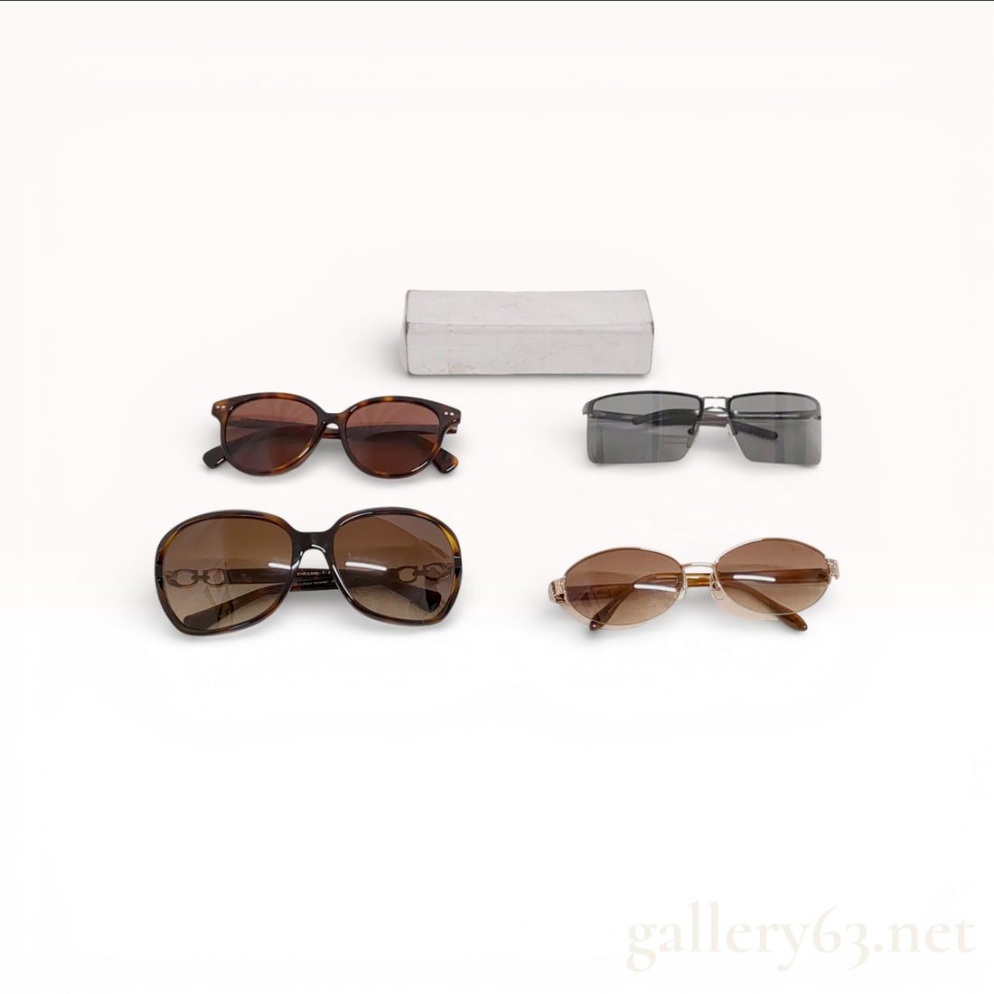 Collection of Designer Sunglasses Including Coach, Givenchy, Kenzo, and Sonia Rykiel: This collection features four pairs of designer sunglasses from notable fashion houses. Included is a pair of Coach HC 8145 (L948) Kissing C sunglasses in dark tortoiseshell acetate with brown gradien