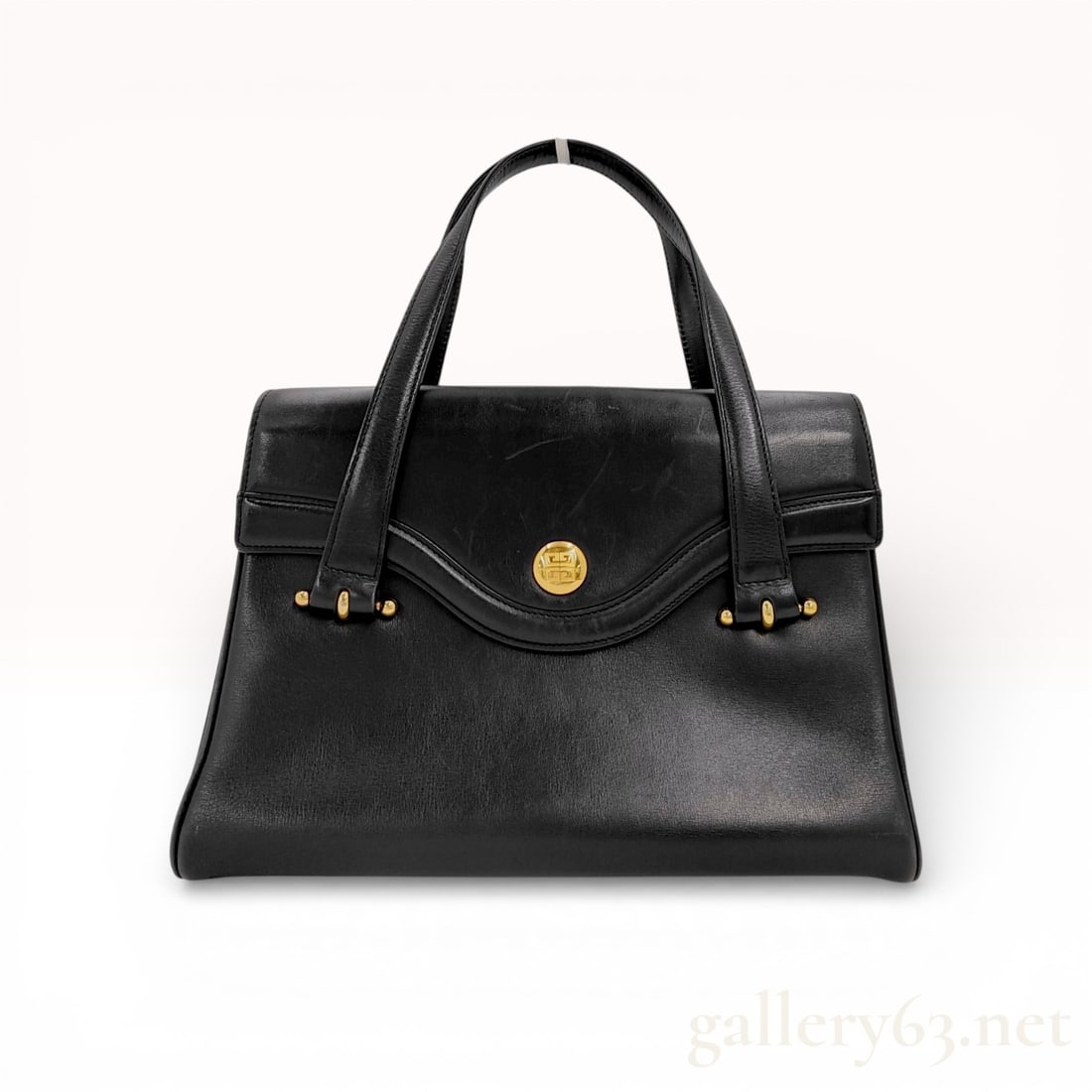 Givenchy Vintage 4G Medallion Smooth Leather Satchel, Black: This vintage Givenchy satchel is constructed from smooth black leather with a structured silhouette. The exterior features a distinctive curved front flap secured by a magnetic closure and embellished