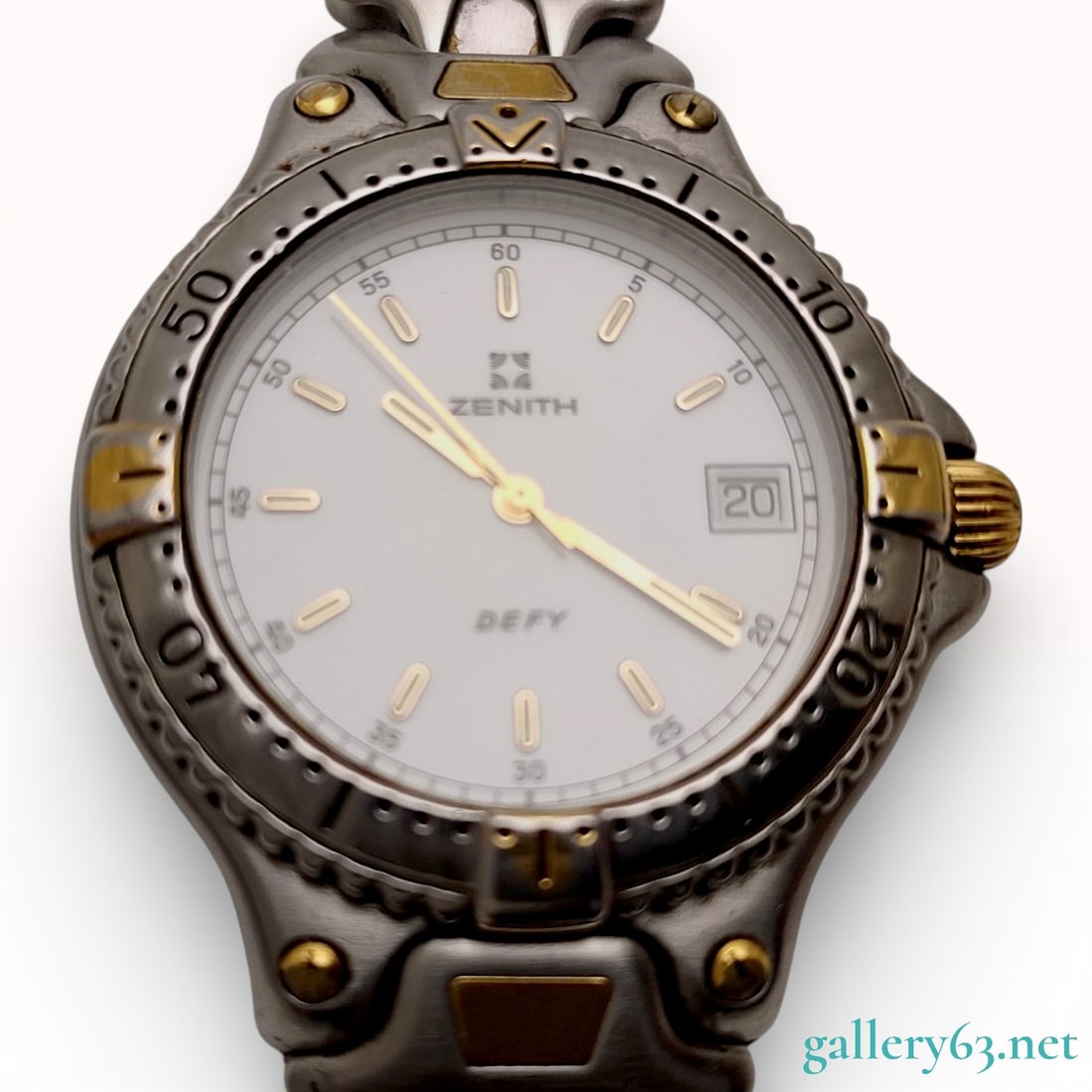 Zenith Defy Two-Tone Diver's Watch: Zenith Defy reference 59.2000.337. Quartz movement. Stainless steel case with gold-toned accents on the bezel and lugs. White dial featuring applied gold-toned baton hour markers, luminous dots, and a