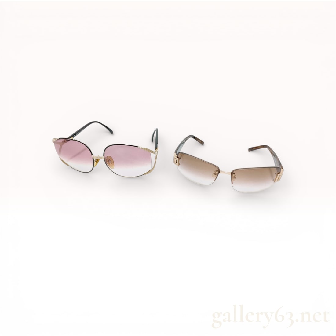 Christian Dior and Celine Designer Sunglasses in Metal and Acetate: This lot features two pairs of authentic designer eyewear. The first pair is a vintage Christian Dior Model 2250, made in Austria, featuring an oversized modified oval silhouette. The frames are const