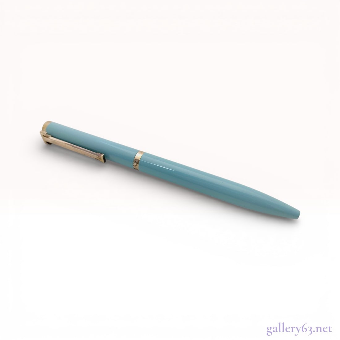 Tiffany & Co. T-Clip Ballpoint Pen in Tiffany Blue Lacquered Brass with Box: This Tiffany & Co. T-Clip ballpoint pen features a barrel and cap finished in signature Tiffany Blue lacquer over a brass base. The silver-toned trim includes the iconic T-shaped clip and a center
