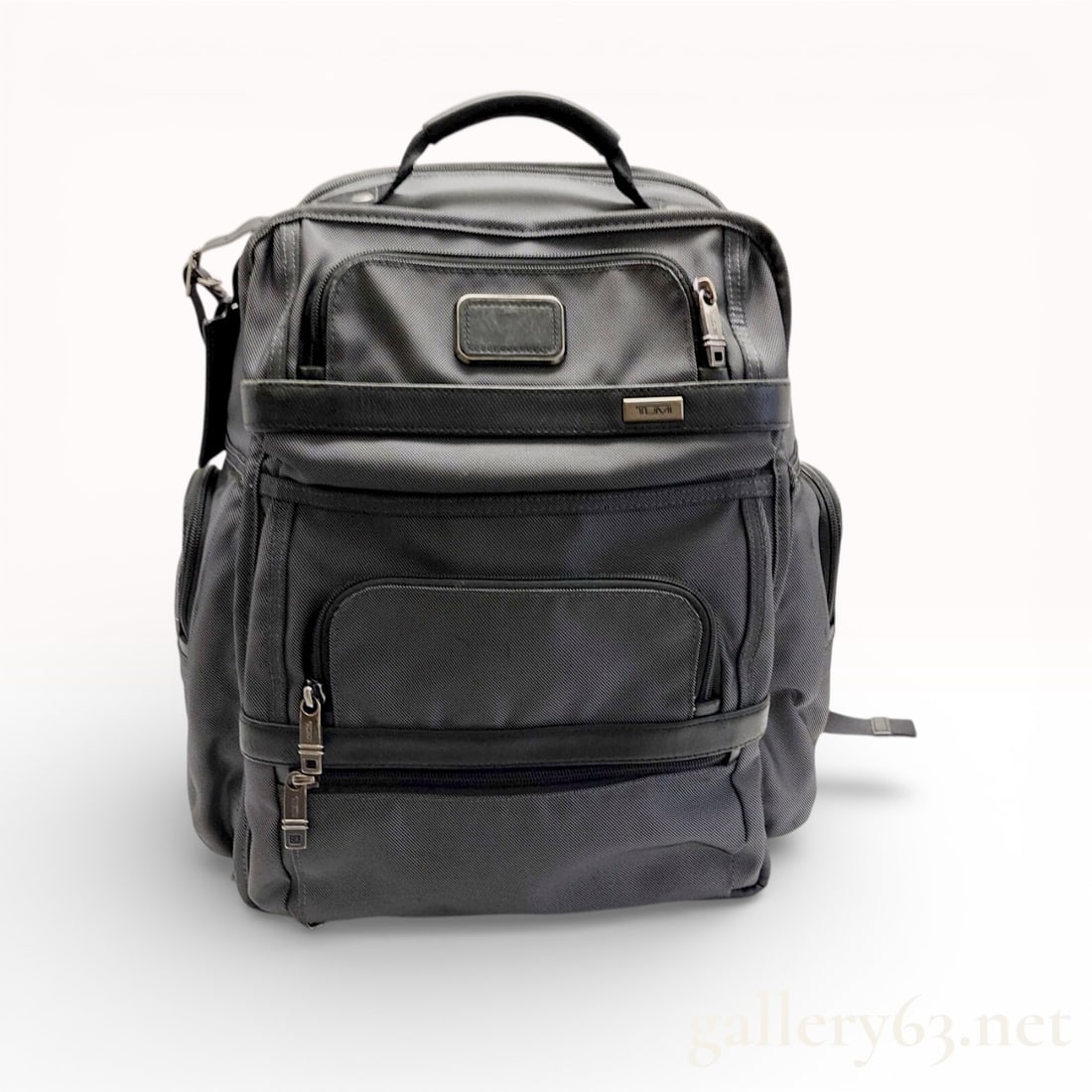 Tumi Alpha 3 Brief Pack Ballistic Nylon Backpack, Charcoal Gray: Tumi Alpha 3 Brief Pack business backpack constructed from heavy-duty ballistic nylon in charcoal gray with black leather accents. This professional-grade bag features multiple exterior zippered organ