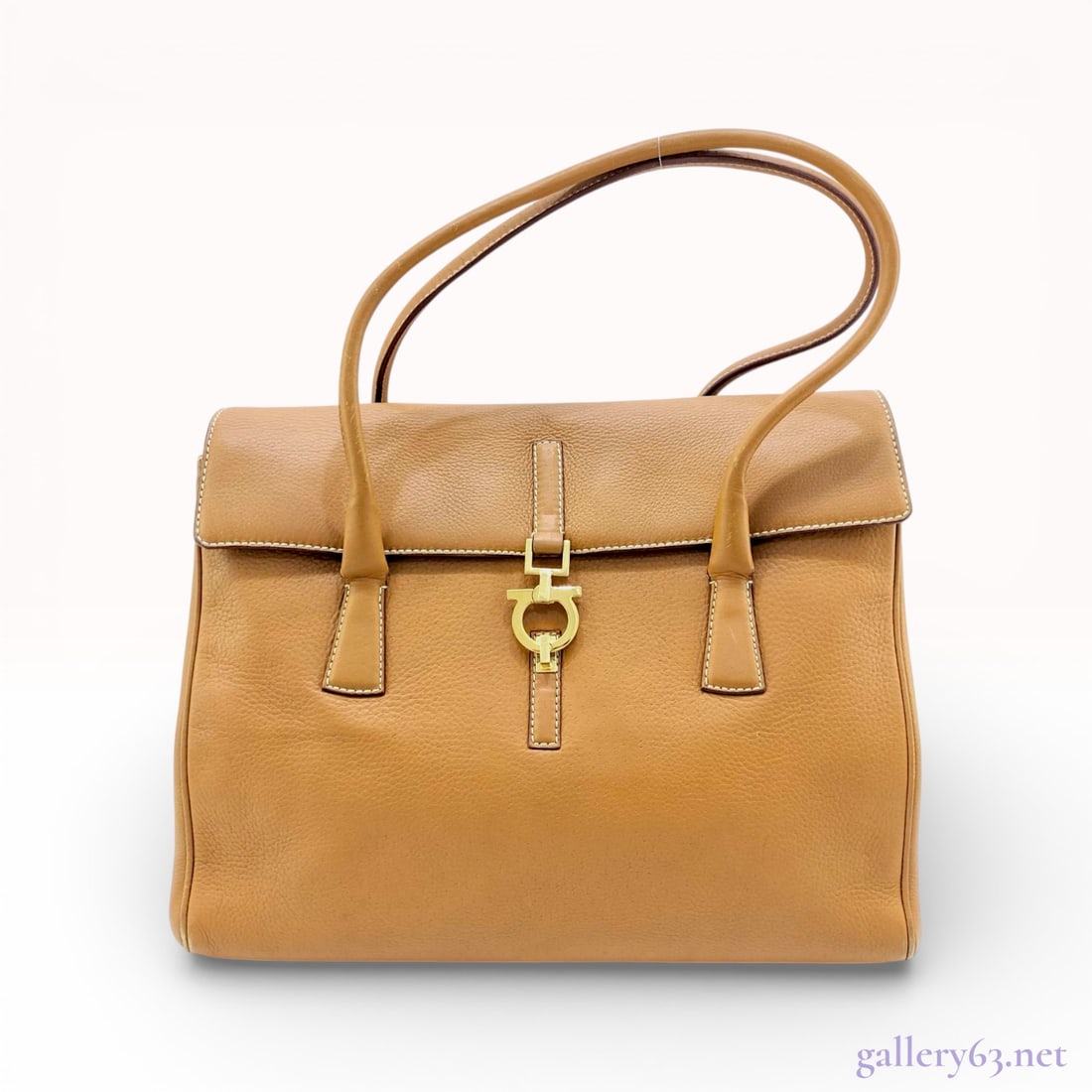 Salvatore Ferragamo Gancini Flap Shoulder Bag, Grained Leather, Camel: A structured shoulder bag by Salvatore Ferragamo featuring the signature Gancini flip-lock closure. Crafted from durable grained calfskin leather in a camel tan hue, the design is accented with contra