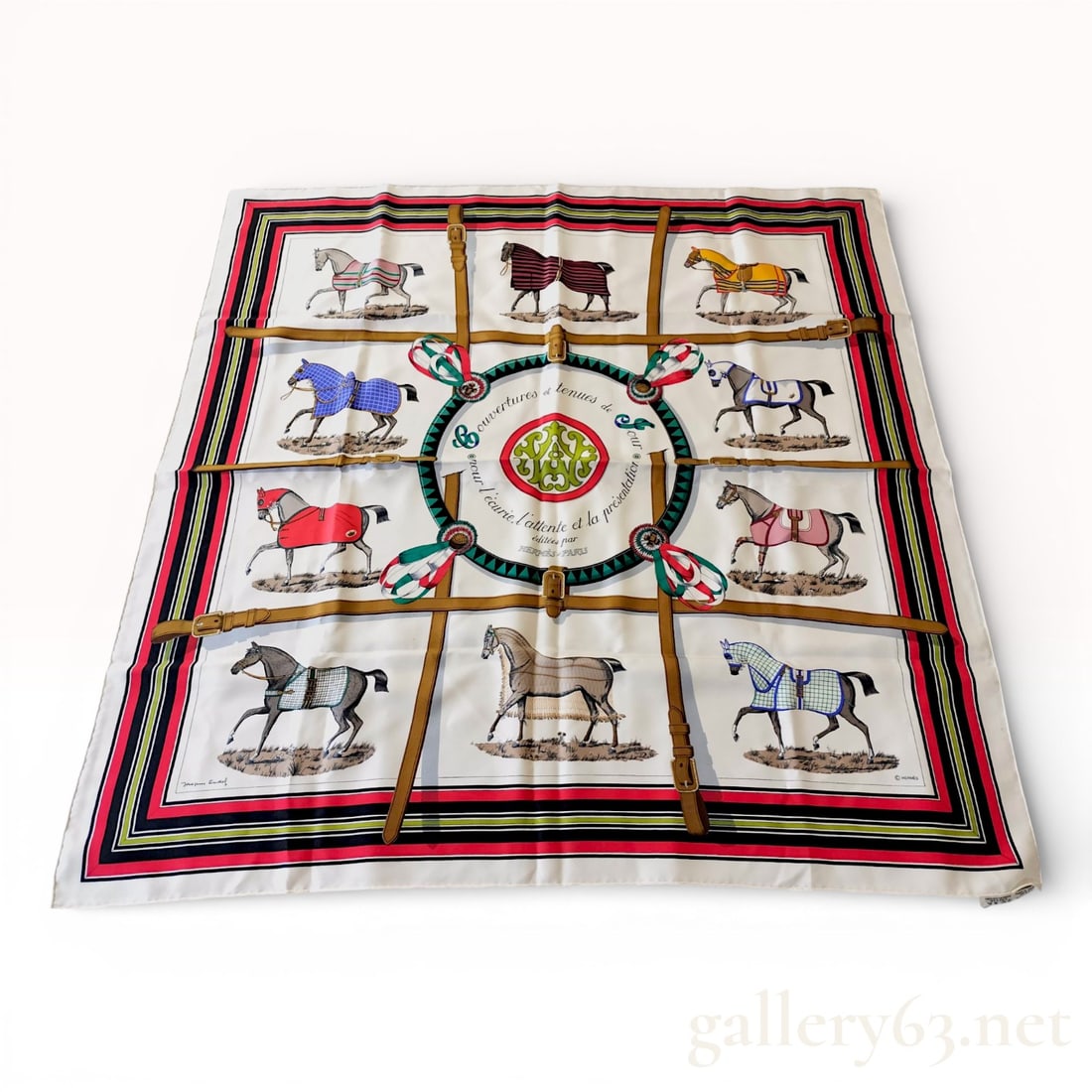 Hermes Silk Carre Scarf, Couvertures et Tenues de Jour Pattern: This authentic Hermes Paris silk twill scarf, titled "Couvertures et Tenues de Jour" (Blankets and Day Wear), was designed by artist Jacques Eudel. The iconic equestrian motif features a cen
