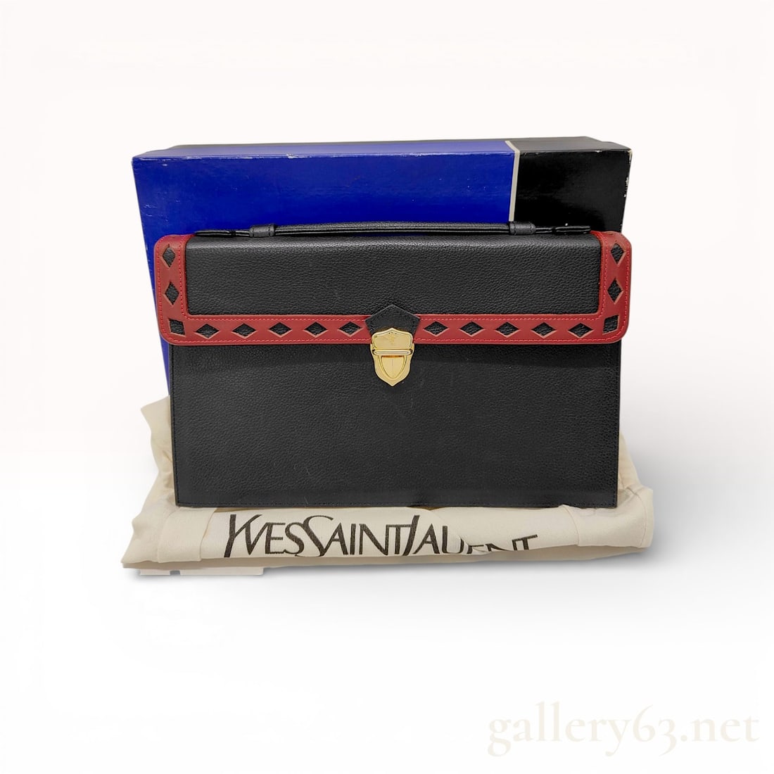Yves Saint Laurent Vintage Pebble-Grain Leather Document Clutch, Black and Red with Box: This vintage Yves Saint Laurent document clutch is a sophisticated example of the brand's licensed production for the Japanese market. Crafted from durable black pebble-grain leather, the structured s