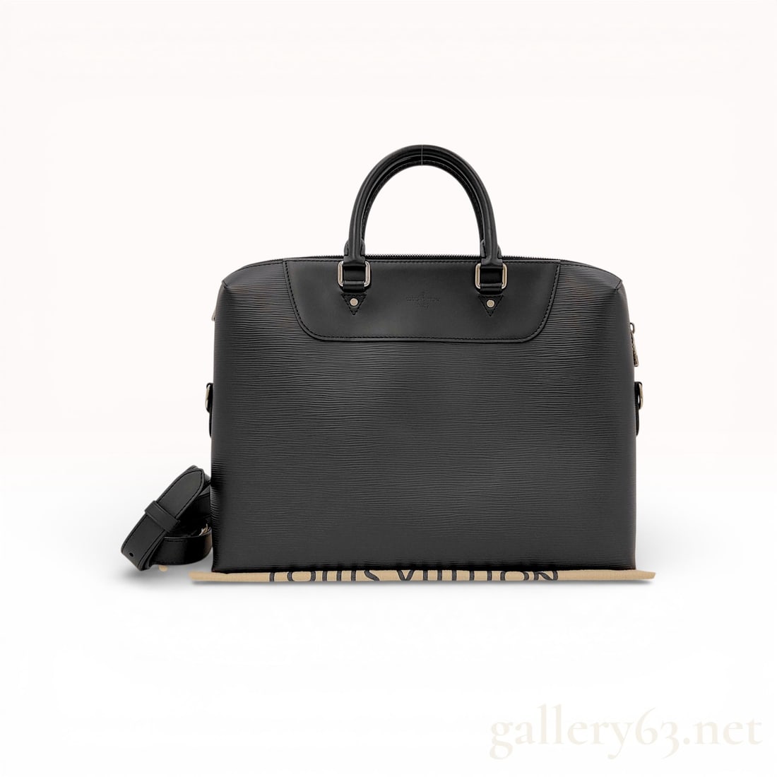 Louis Vuitton Porte-Documents Jour Briefcase Epi Leather Noir: A professional Louis Vuitton Porte-Documents Jour briefcase crafted in black Epi leather with tonal smooth leather trim. This sophisticated business bag features silver-tone hardware, double rolled