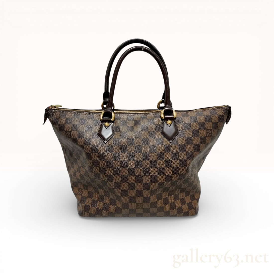 Louis Vuitton Saleya MM Damier Ebene Canvas Tote Bag Brown: This Louis Vuitton Saleya MM tote is crafted from signature Damier Ebene checkered coated canvas with dark chocolate brown cowhide leather trim. The structured silhouette features dual rolled leather