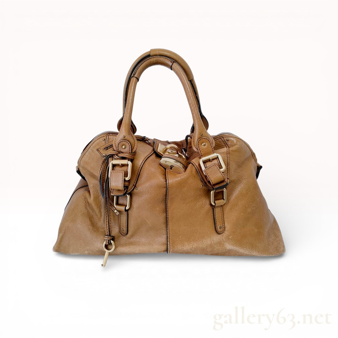 Chloé Paddington Satchel, Grained Calfskin Leather, Tan: This Chloé Paddington satchel is a signature "it-bag" from the mid-2000s, crafted from supple, pebbled tan calfskin leather. The design features the iconic oversized brushed-brass