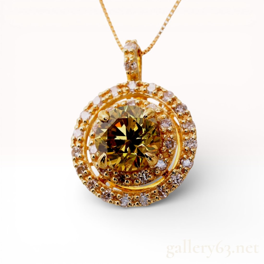 18k Yellow Gold Diamond Halo Pendant Necklace Featuring a 1.018 Carat Fancy Deep Brownish Greenish: This 18k yellow gold pendant necklace features a significant 1.018 carat round brilliant cut natural diamond as its centerpiece. According to the included Gem Grading System Japan (GGS) report, the