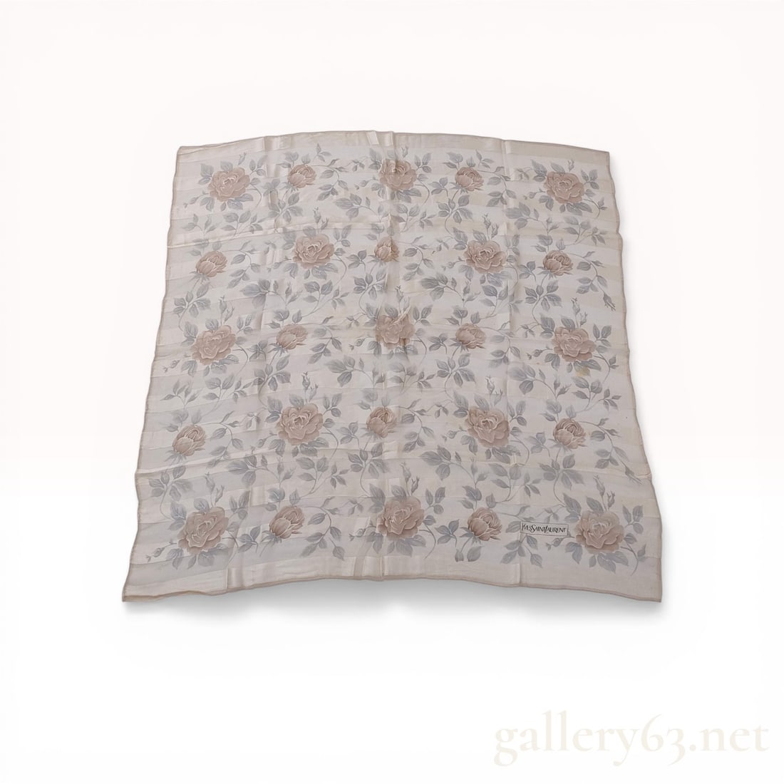Yves Saint Laurent Silk Floral Square Scarf: Yves Saint Laurent square silk scarf featuring an allover rose floral design in dusty rose and taupe tones. The fabric is a horizontal shadow stripe weave with alternating sheer and opaque bands and f