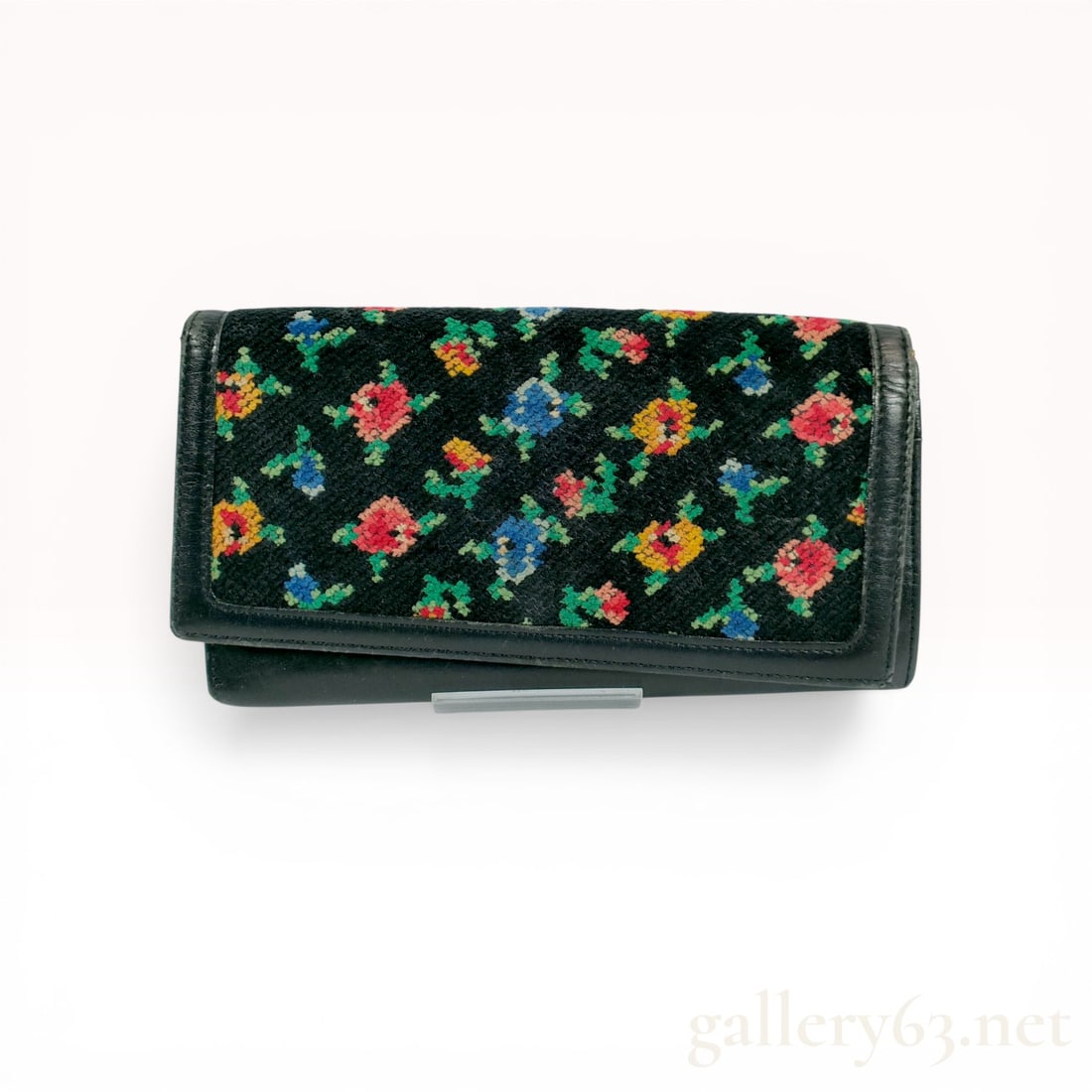 Feiler Black Leather Continental Flap Wallet with Floral Chenille Panel: Feiler continental flap wallet featuring a black leather body and a floral chenille tapestry panel. The interior is lined in black leather and contains multiple card slots, a full-length bill compartm