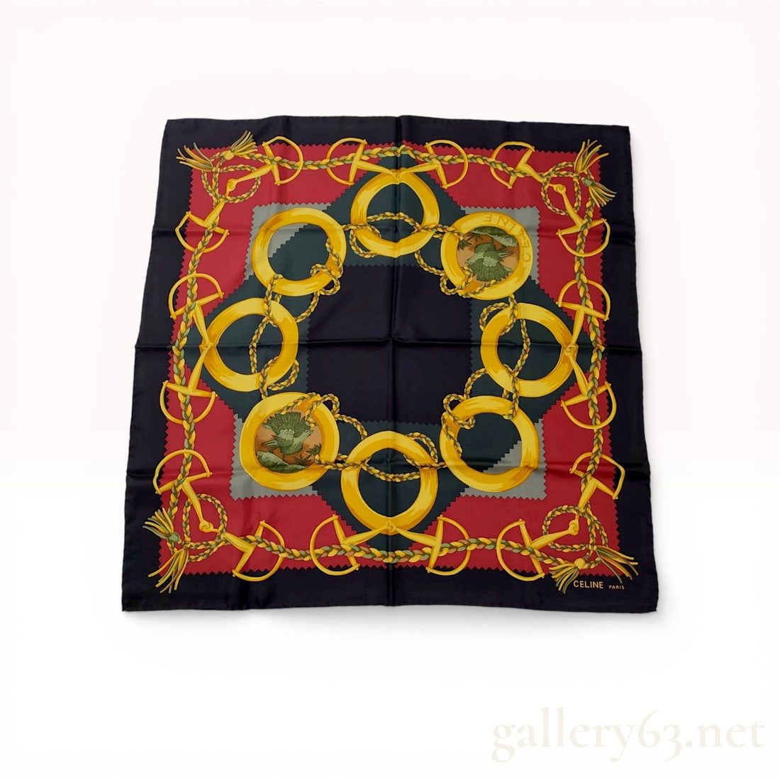 Celine Paris Silk Equestrian and Ornithological Print Scarf: Celine Paris square silk scarf featuring an equestrian and ornithological motif, late 20th century. The 100% silk textile displays a central design of gold-tone rings, snaffle bits, and braided ropes