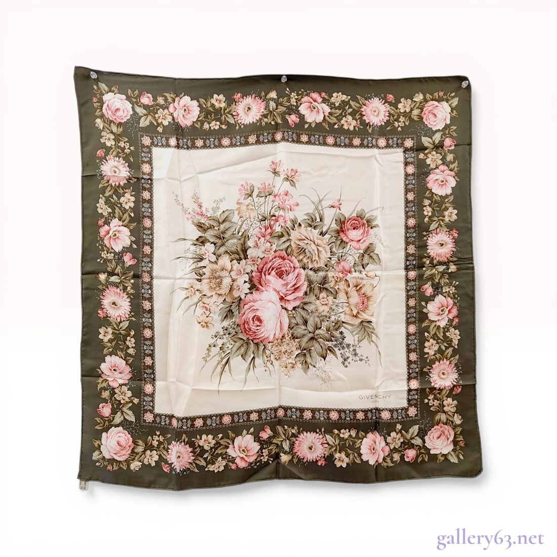 Givenchy Paris Floral Silk Scarf: Givenchy Paris square scarf featuring a floral motif with a central bouquet of pink, cream, and tan roses on an ivory field. Constructed of 100% silk twill with hand-rolled edges, the piece includes