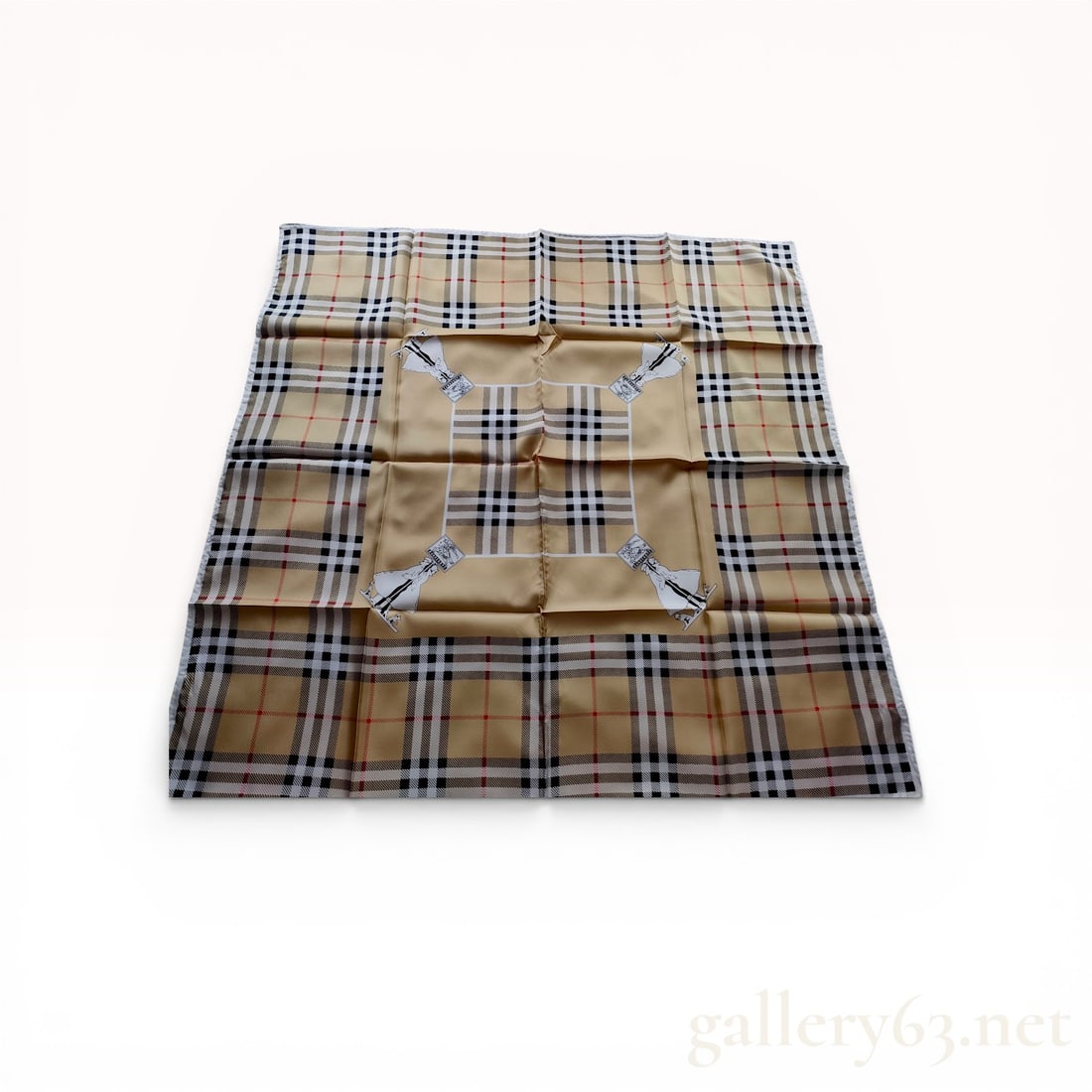 Burberrys Vintage Silk House Check Pocket Square with Trench Coat Graphic: Vintage Burberrys silk pocket square featuring the signature house check border and a central graphic of four figures in trench coats holding equestrian knight banners. This Italian-made accessory is