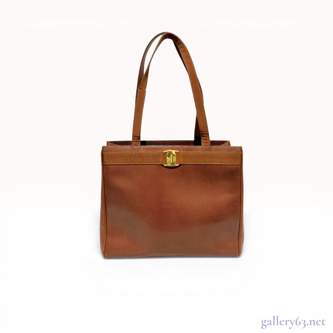 Salvatore Ferragamo Lizard Leather Vara Bow Tote Bag: Salvatore Ferragamo Vara bow shopper tote in tan lizard leather, manufactured in Italy. The exterior features a tonal grosgrain ribbon bow with a gold-toned signature-engraved metal plate and dual fla