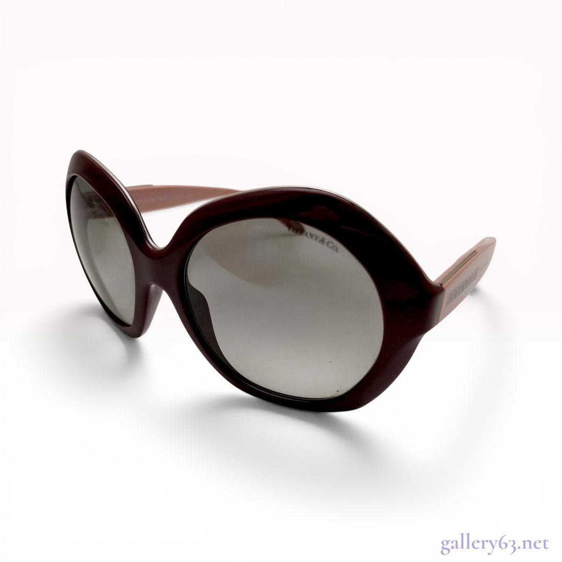 Tiffany and Co. TF 4116 Atlas Collection Oversized Sunglasses: Tiffany and Co. oversized sunglasses, model TF 4116, manufactured in Italy. The modified butterfly frames are constructed of two-tone burgundy and dusty rose acetate with silver-tone metal Atlas colle