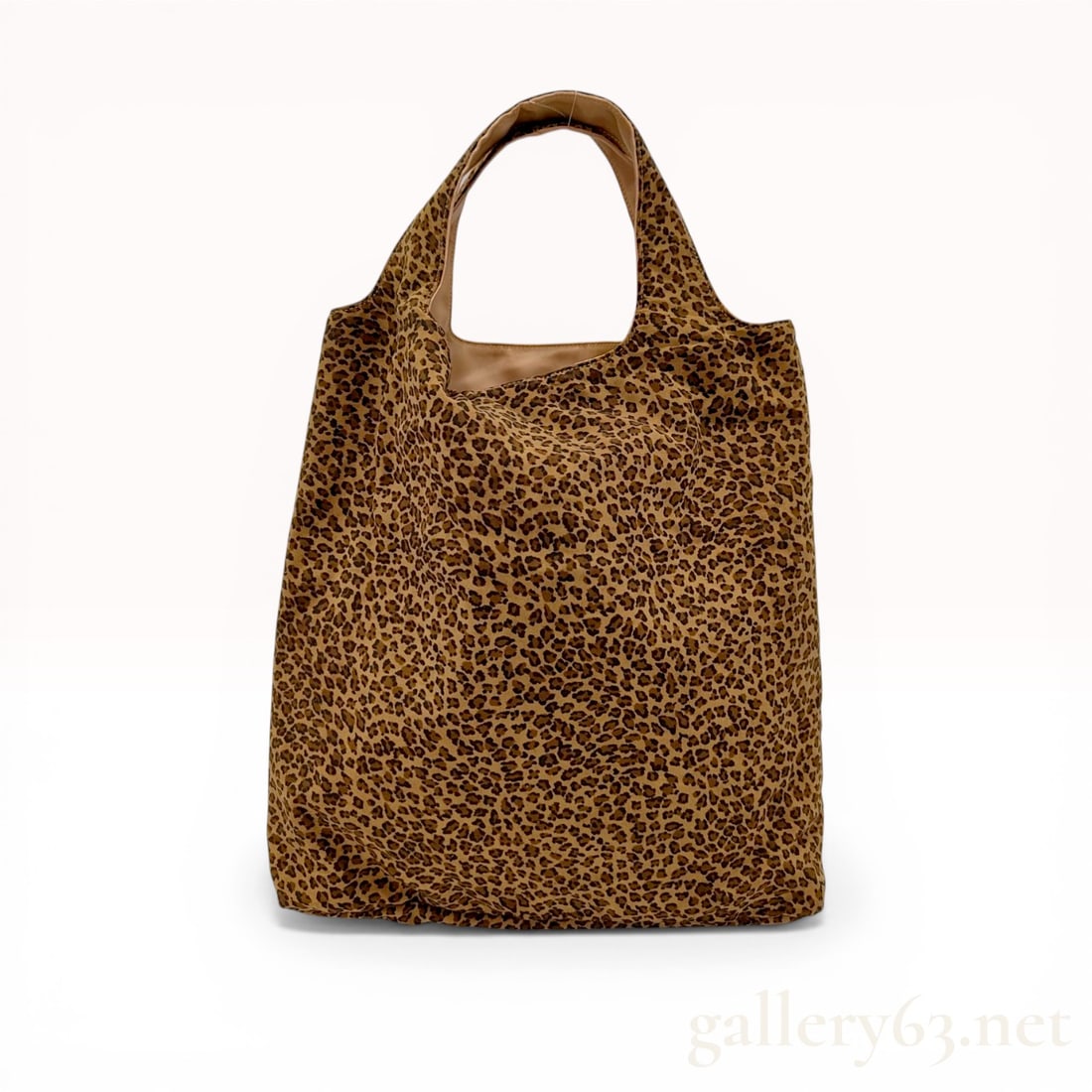 Bottega Veneta Leopard Print Technical Fabric Tote Bag: Bottega Veneta leopard print tote bag, contemporary. This lightweight accessory features a leopard pattern technical fabric exterior with a tan synthetic lining and gunmetal-tone hardware. It is desig