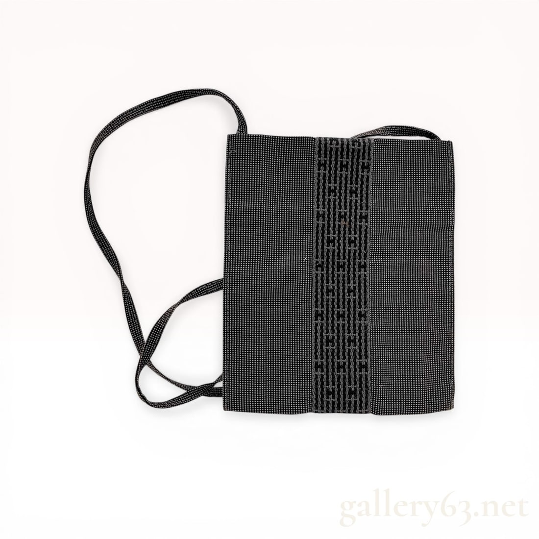 Hermes Herline Pochette Canvas Crossbody Bag: Hermes Herline pochette crossbody bag, late 20th or early 21st century. Features a grey and black micro-check canvas body with a central vertical woven band displaying a repeating H motif and a