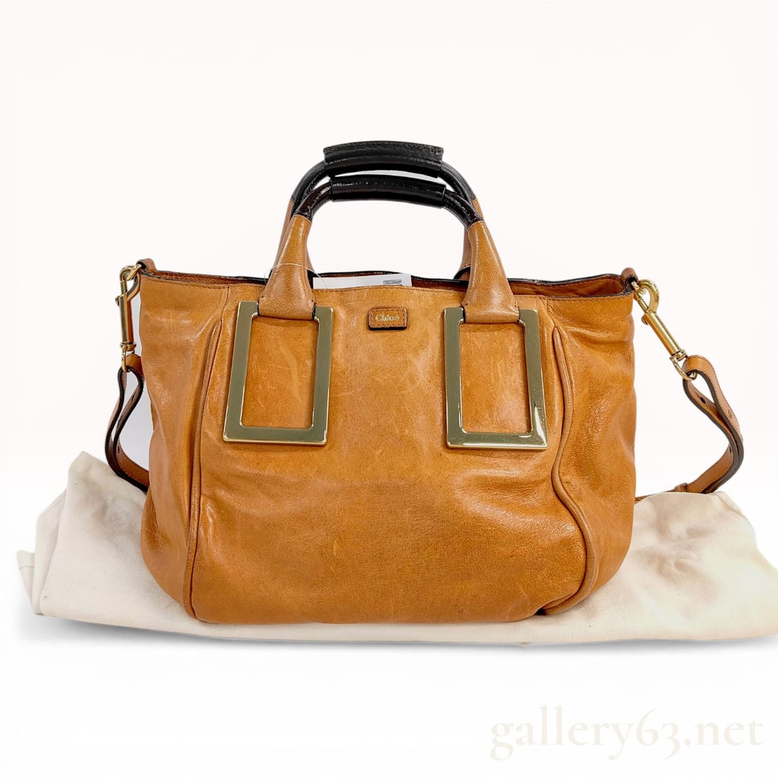 Chloe Ethel Leather Satchel Bag: Chloe Ethel satchel crafted from textured camel-toned leather with dark brown glazed leather handle accents and polished gold-tone hardware. The design features dual rolled top handles, a detachable a