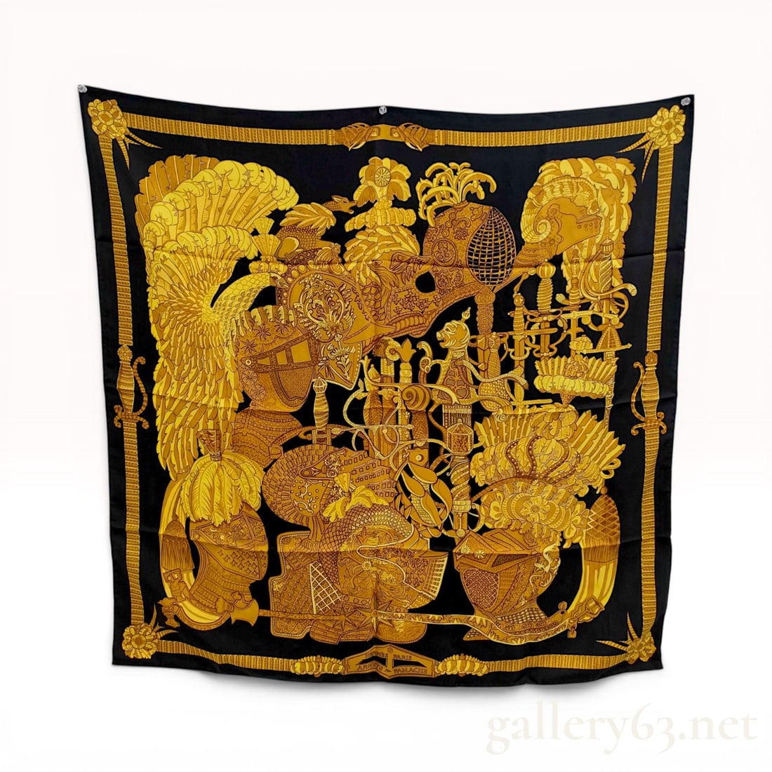 Hermes Armets en Panache Silk Twill Scarf: Hermes silk twill scarf in the Armets en Panache pattern, late 20th century. The design features Renaissance-style helmets with ostrich plumes and ceremonial weaponry in a black and gold colorway with