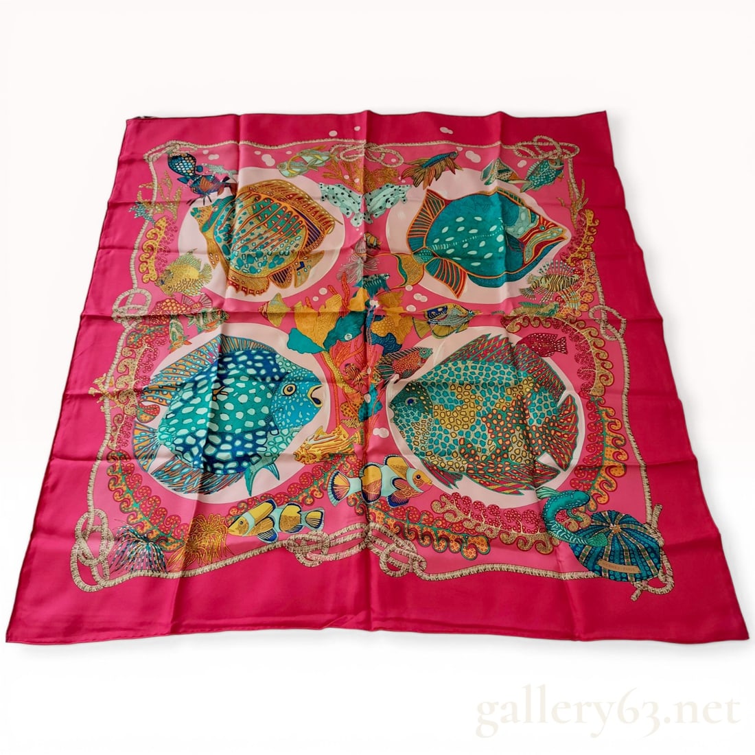 Herm?¨s Grands Fonds Silk Scarf by Annie Faivre: Hermès silk scarf in the Grands Fonds pattern, designed by artist Annie Faivre and first issued circa 1992. The 100% silk twill construction features a marine-themed illustration of tropical
