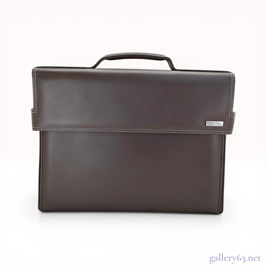 Jaeger-LeCoultre Dark Brown Calfskin Leather Executive Briefcase: Incredible Jaeger-LeCoultre structured briefcase in dark brown calfskin leather with cream-colored contrast topstitching. The exterior features a single top handle and a front flap secured by magnetic