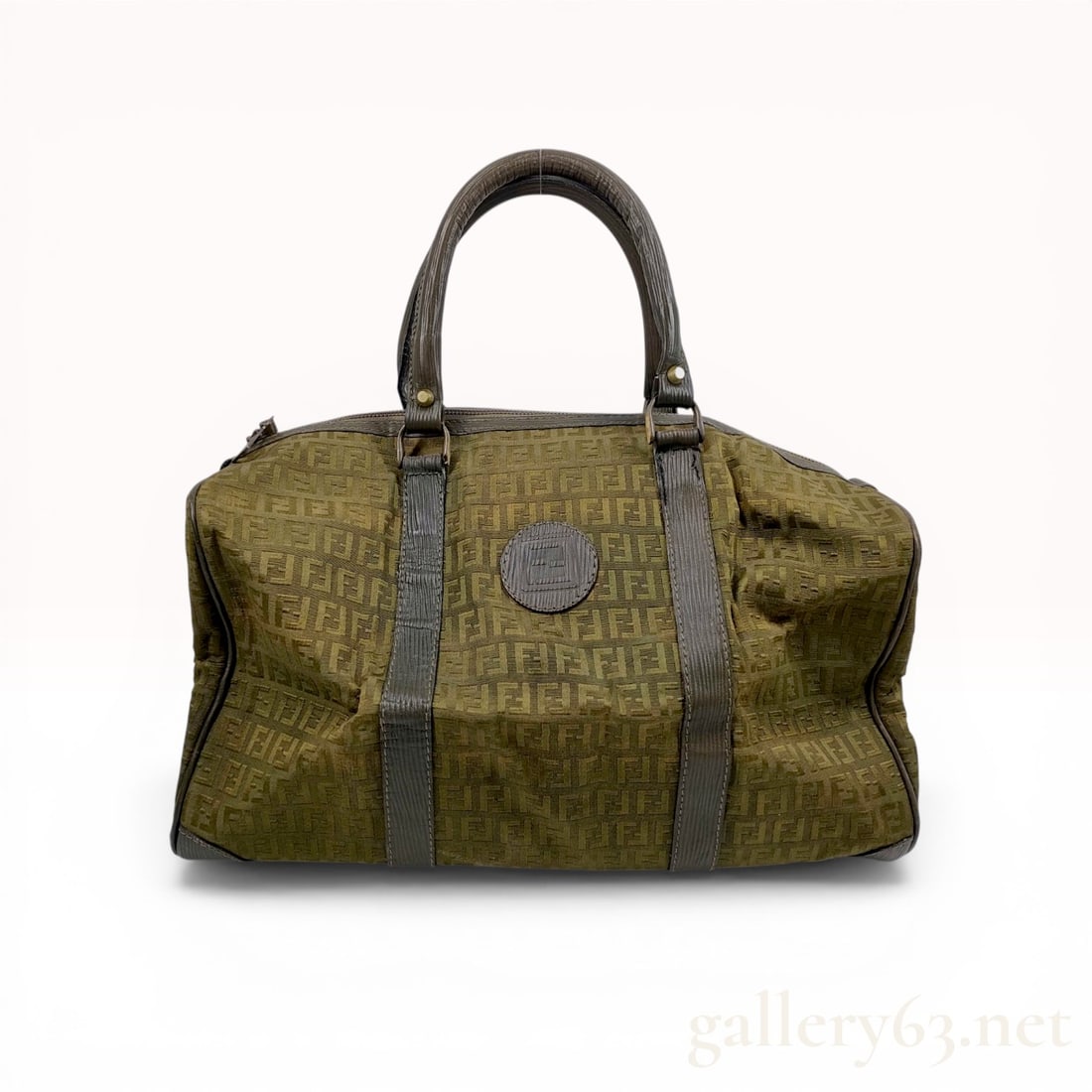 Fendi Zucca Monogram Canvas Boston Bag: Fendi Boston bag in the Zucca monogram pattern, late 20th century. The exterior is constructed from olive green and brown jacquard canvas with dark brown textured leather trim, dual rolled handles, an