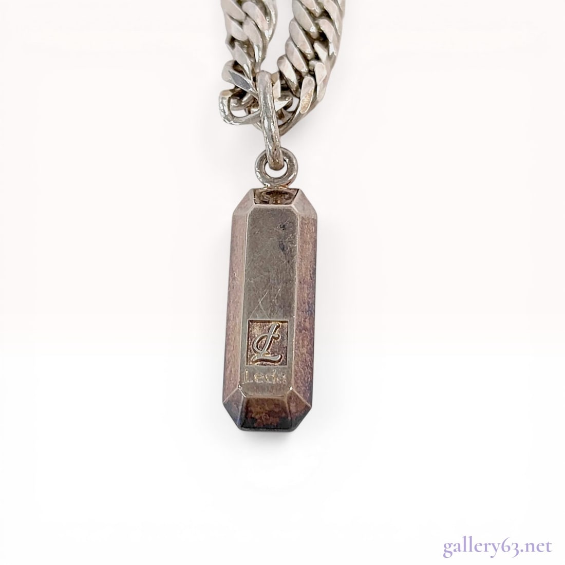 Leda Silma Bar Pendant Necklace with Curb-Link Chain, Sterling Silver: Leda Silma pendant necklace featuring a rectangular bar pendant with faceted edges. The silver pendant is suspended from a flat curb-link chain secured by a lobster claw clasp. The pendant face and ch