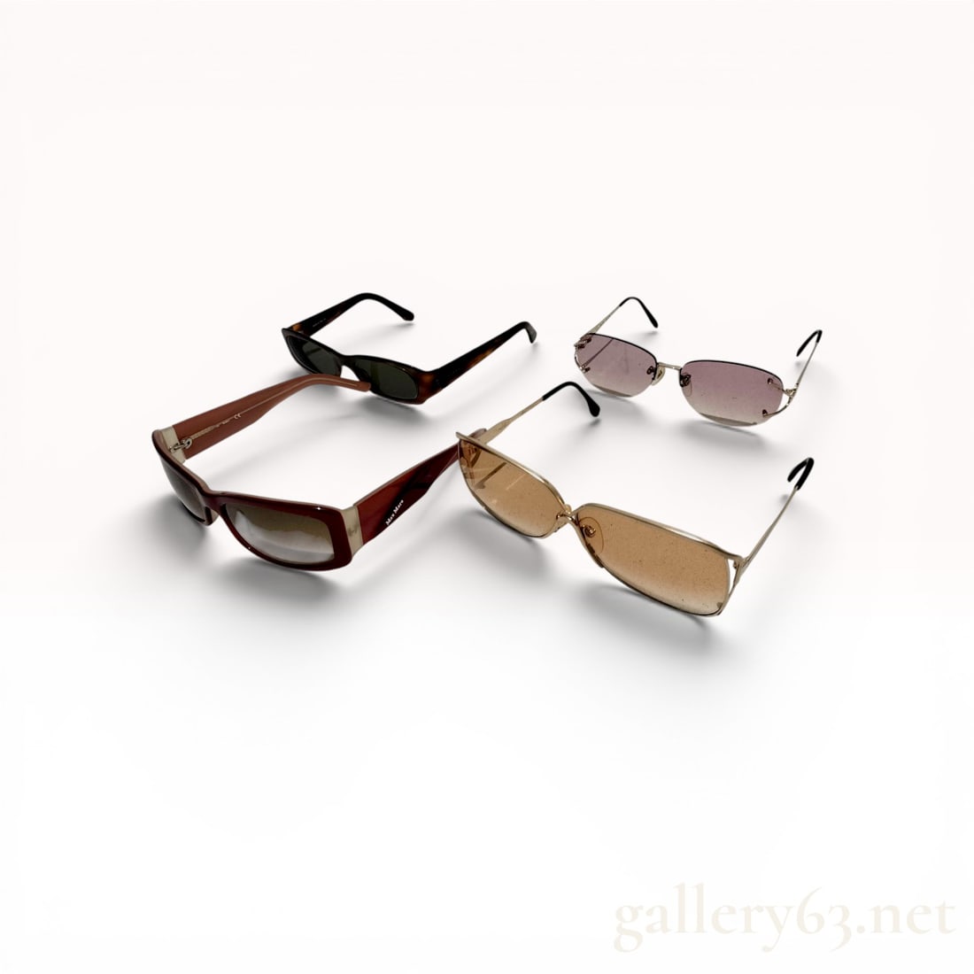 A Group of Designer Sunglasses Including Max Mara, Loewe, and Yves Saint Laurent: A group of four pairs of designer and fashion sunglasses and one protective hard case, late 20th to early 21st century. The collection includes burgundy Max Mara wrap-around frames, tortoiseshell Loew