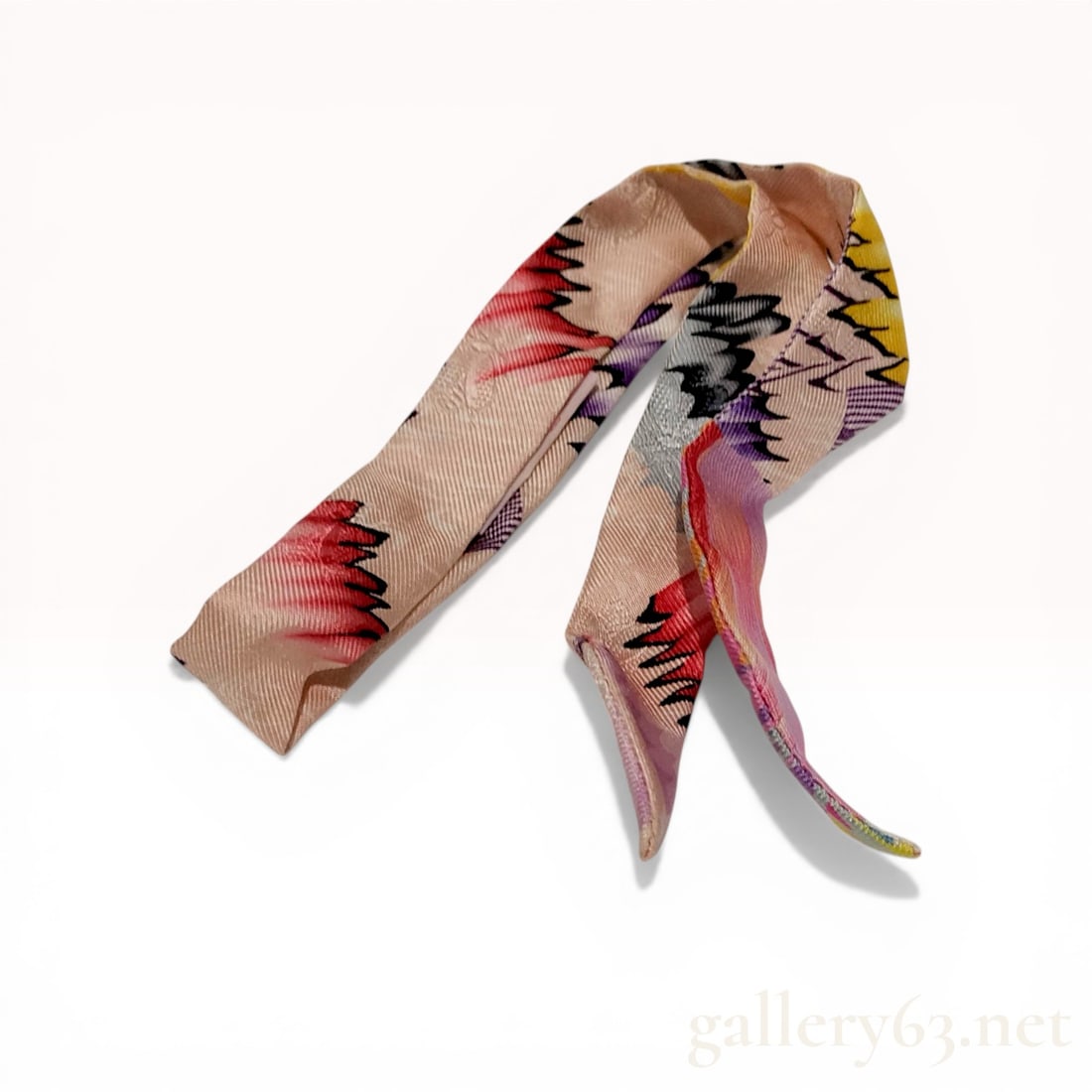 Herm?¨s Marble Silk Twilly Scarf: Hermès Marble Silk twilly scarf featuring an abstract jagged motif in shades of red, violet, charcoal, and yellow on a pink ground. The double-layered silk ribbon is constructed with pointed en