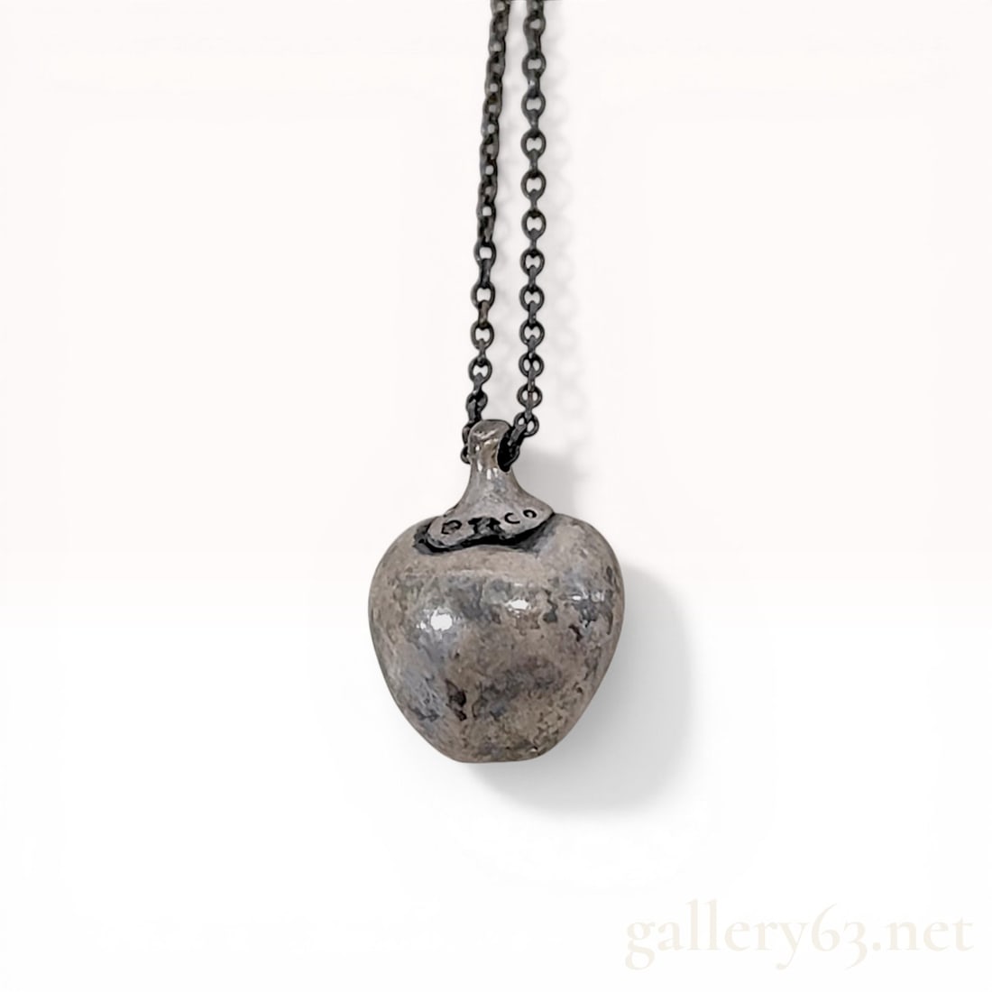 Tiffany and Co. Elsa Peretti Sterling Silver Apple Pendant Necklace: Tiffany and Co. sterling silver apple pendant necklace designed by Elsa Peretti. The piece features a three-dimensional apple-shaped pendant suspended from a fine cable link chain with a spring ring c