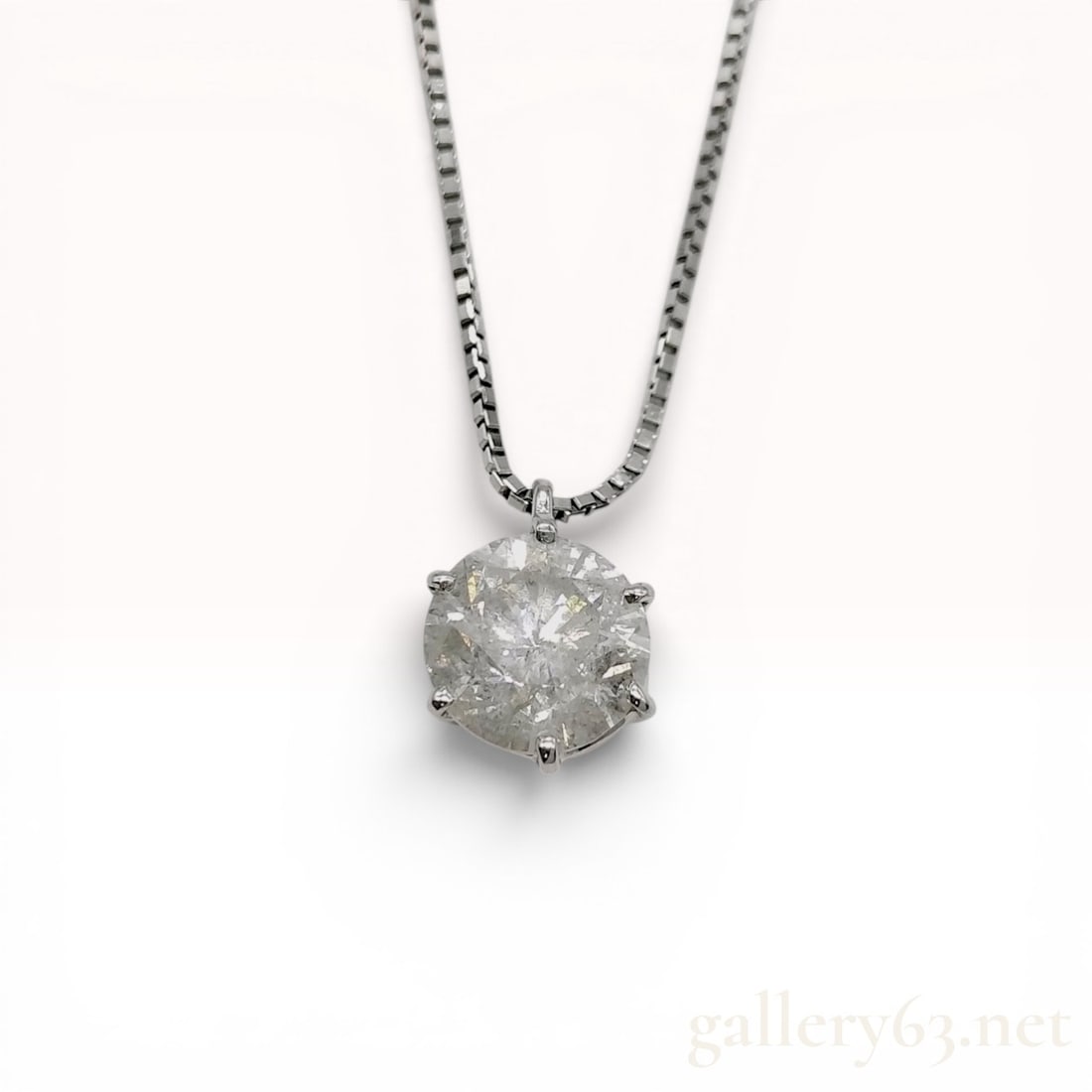 Platinum Diamond Solitaire Pendant Necklace 1.167 Carat: Platinum diamond solitaire pendant necklace featuring a round brilliant cut diamond. The diamond is secured in a six-prong Pt900 platinum setting and suspended from a Pt850 platinum box chain. The cha