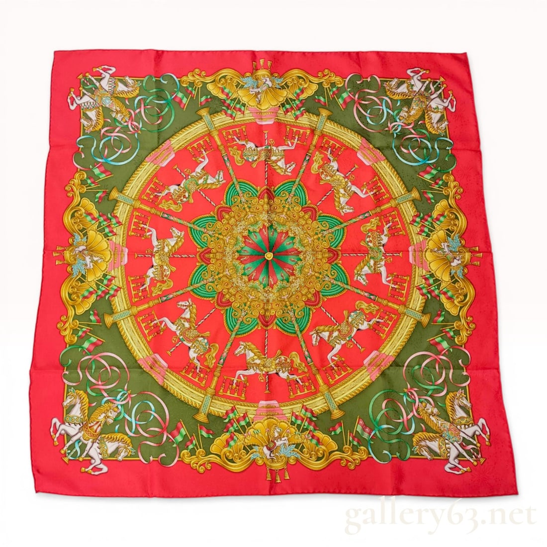 Hermes Luna Park Silk Jacquard Carre 90 Scarf: Hermes silk twill scarf in the Luna Park pattern designed by Joachim Metz, late 20th century. The design features a carousel theme with white horses and golden architectural elements on a forest green