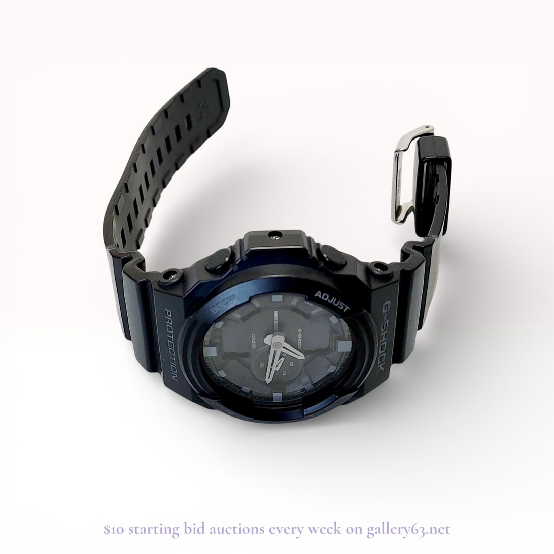 Casio G-Shock GA-150-1AJF Analog-Digital Wristwatch: Casio G-Shock analog-digital wristwatch, model GA-150 with module 5255. The timepiece features a black resin case and integrated strap with a matte black and charcoal grey dial, luminous hands, and th