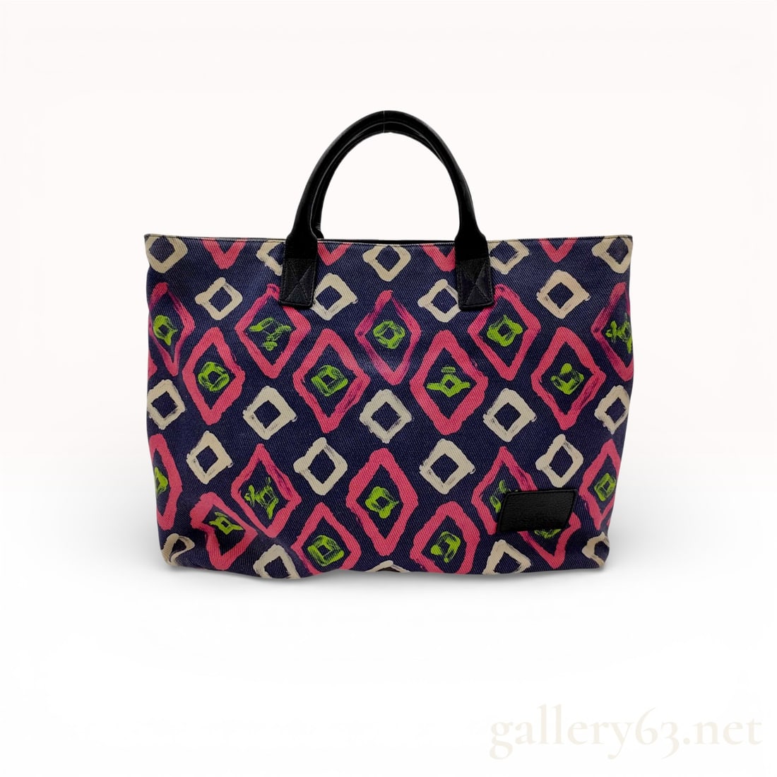 Vivienne Westwood Printed Canvas Tote Bag: Vivienne Westwood large tote bag featuring an all-over stylized diamond and orb print on navy blue canvas, contemporary. The exterior is designed with dual rolled black leather handles, a top zip clos