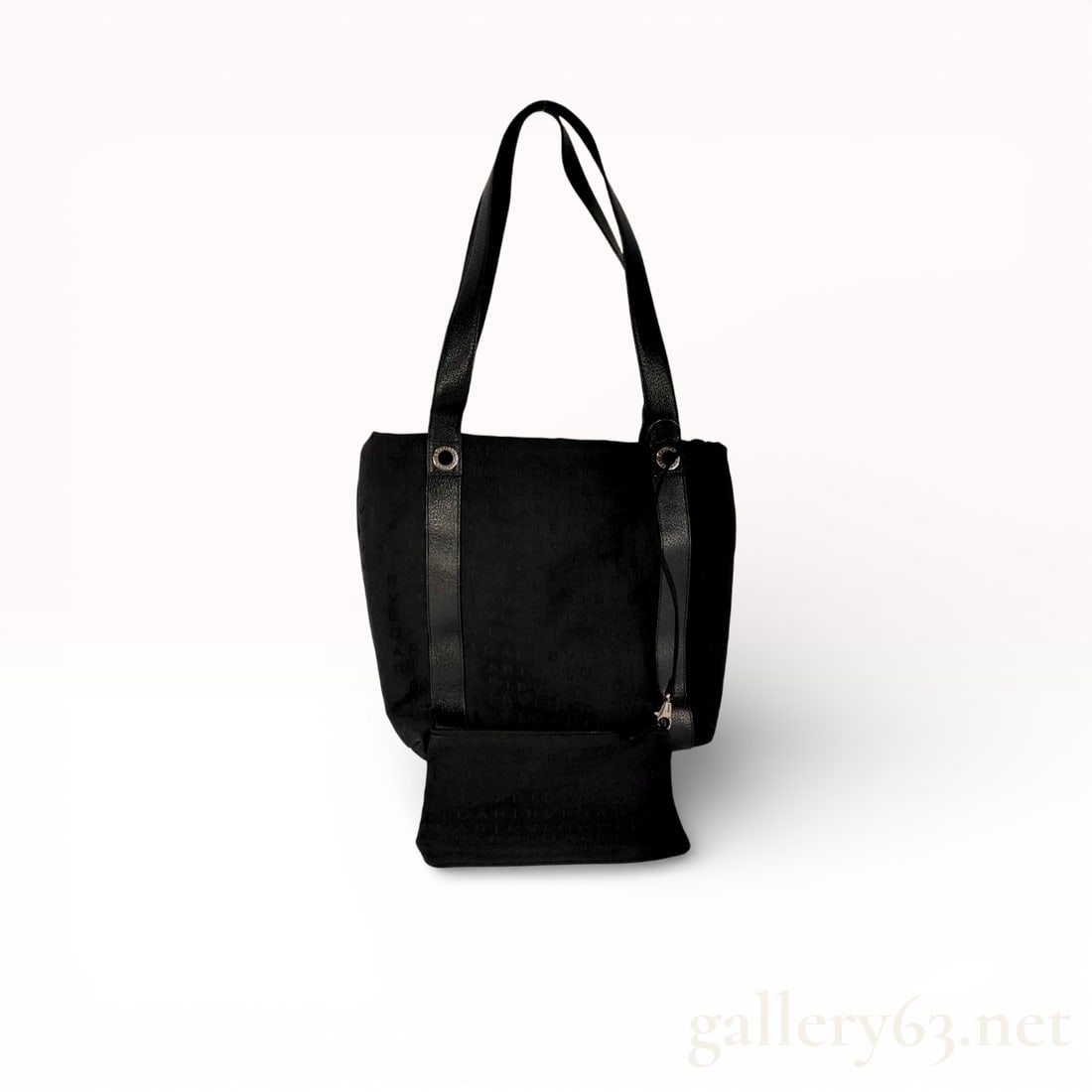 Bulgari Logomania Jacquard Canvas Tote Bag with Pouch: Bulgari Logomania tote bag featuring black logo-patterned jacquard canvas with black grained leather trim. The open-top design includes a red textile-lined interior with a zippered pocket and an attac