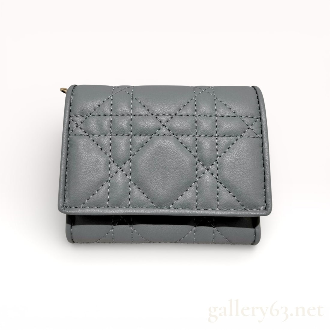 Christian Dior Lady Dior Lotus Wallet in Gray Cannage Lambskin: Christian Dior Lady Dior Lotus wallet in gray Cannage quilted lambskin leather, likely the Cloud Blue colorway. This trifold accessory features a snap-flap coin compartment and an interior with card s