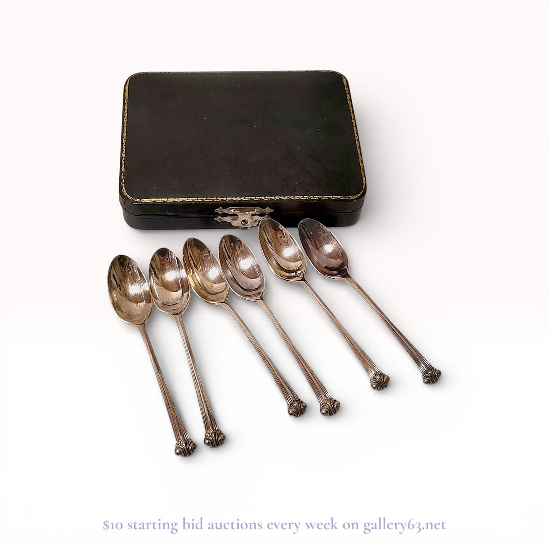 A Set of Ikoma Shoten Japanese Pure Silver Demitasse Spoons: Ikoma Shoten Japanese pure silver demitasse spoons, late Meiji to Taisho period. Each spoon features a reeded handle with scrolled shell terminals and a polished oval bowl, presented in a fitted black