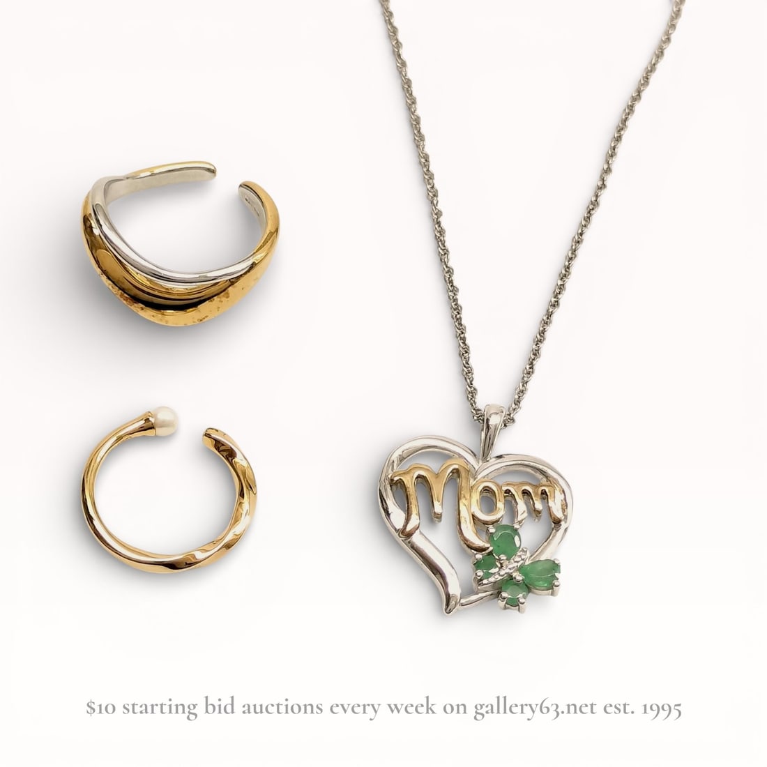 Two Pieces of Sterling Silver Jewelry Including an ete Bypass Ring and a 14K Gold Accent Mom Pendant: This lot consists of a minimalist bypass-style ring by Japanese brand ete and a heart-shaped pendant necklace. The adjustable ring is crafted from 925 sterling silver with a two-tone gold-plated finis