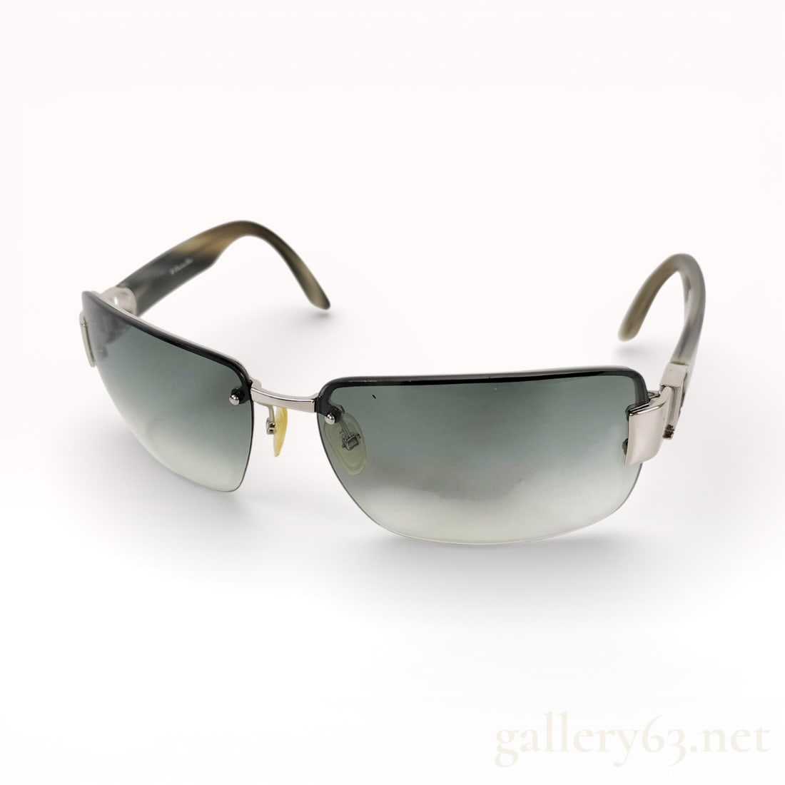 Christian Dior I Love Dior 2 Semi-Rimless Sunglasses: Christian Dior I Love Dior 2 sunglasses manufactured in Italy. The design features rectangular gray gradient lenses with a silver-tone metal bridge and decorative openwork D logo hinges. The temples a